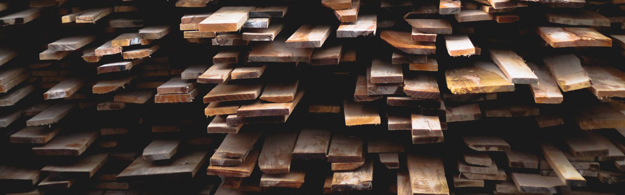The wood planks in these stacks are each of different lengths. Why is no policy in place to make them easier to sort?